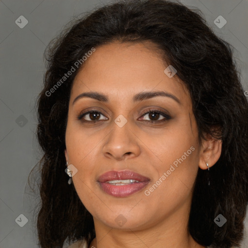 Joyful latino young-adult female with long  brown hair and brown eyes