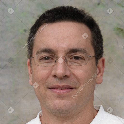 Joyful white adult male with short  brown hair and brown eyes