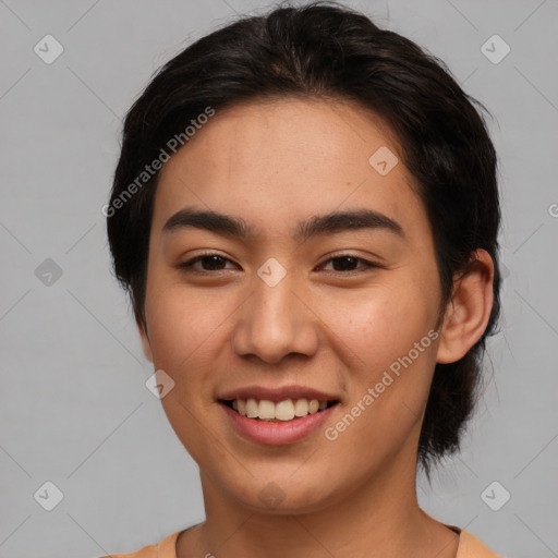 Joyful asian young-adult female with medium  brown hair and brown eyes