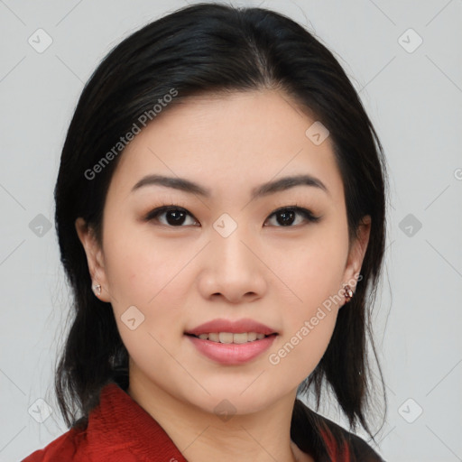 Joyful asian young-adult female with medium  black hair and brown eyes