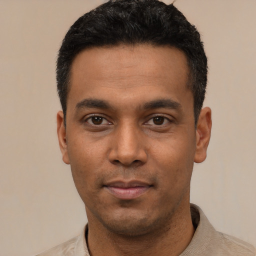 Neutral latino young-adult male with short  black hair and brown eyes