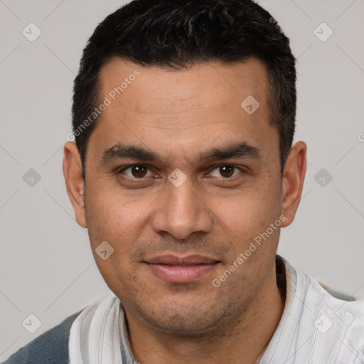 Joyful white young-adult male with short  black hair and brown eyes