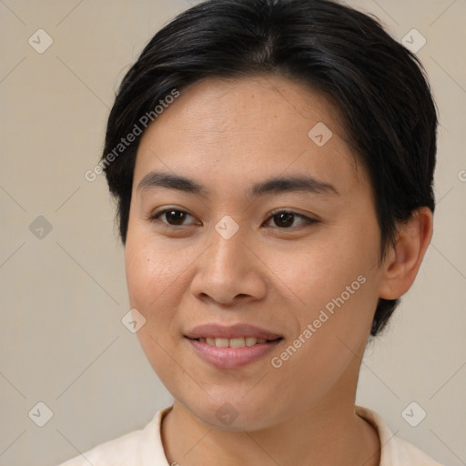 Joyful asian young-adult female with medium  brown hair and brown eyes