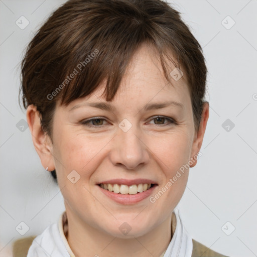 Joyful white adult female with short  brown hair and brown eyes