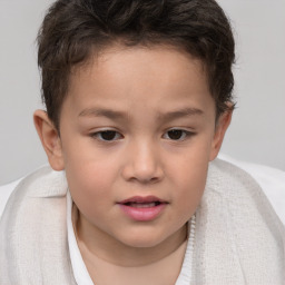 Joyful white child female with short  brown hair and brown eyes