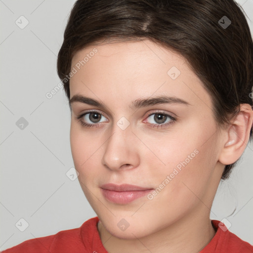 Neutral white young-adult female with long  brown hair and brown eyes