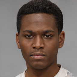 Neutral black young-adult male with short  brown hair and brown eyes