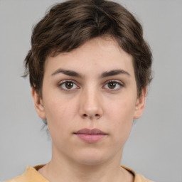 Neutral white young-adult female with short  brown hair and brown eyes