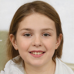 Joyful white child female with medium  brown hair and brown eyes