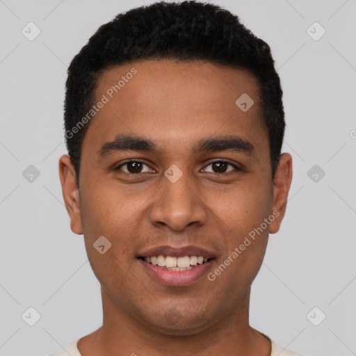 Joyful latino young-adult male with short  brown hair and brown eyes