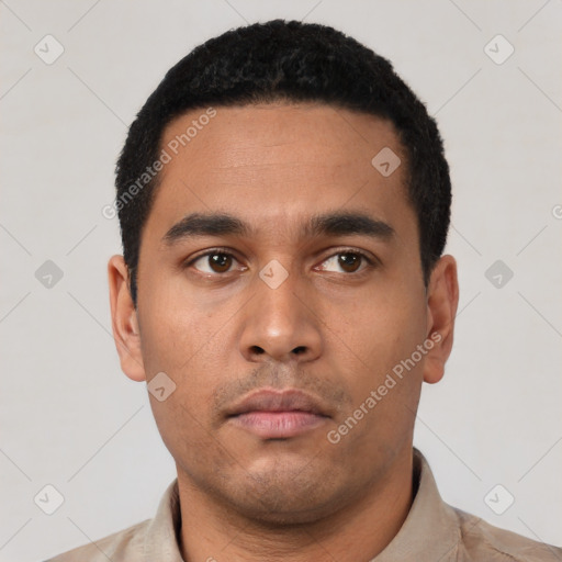 Neutral latino young-adult male with short  black hair and brown eyes