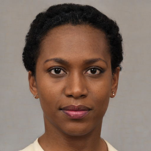 Neutral black young-adult female with short  black hair and brown eyes