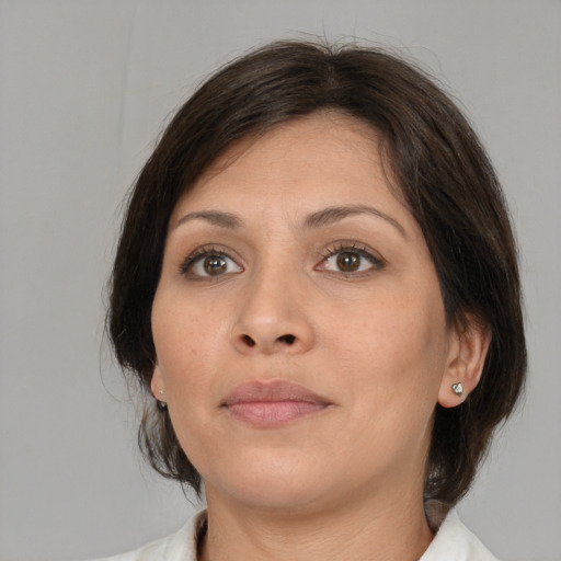 Neutral white young-adult female with medium  brown hair and brown eyes
