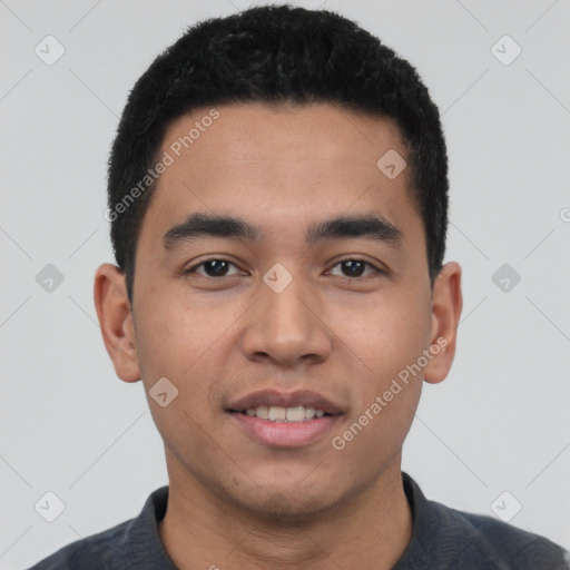 Joyful latino young-adult male with short  black hair and brown eyes