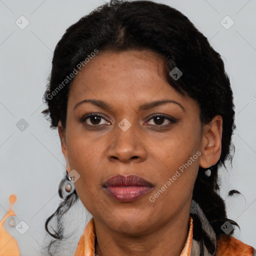 Joyful black adult female with short  brown hair and brown eyes