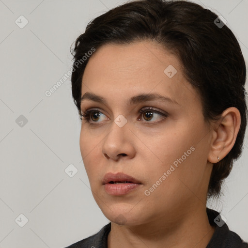 Neutral white young-adult female with medium  brown hair and brown eyes