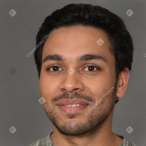 Joyful latino young-adult male with short  brown hair and brown eyes