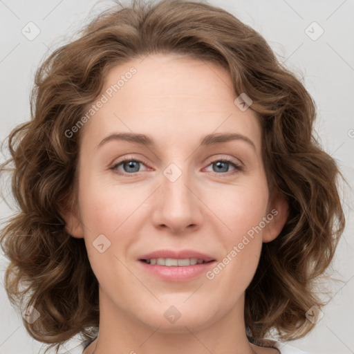 Joyful white young-adult female with medium  brown hair and green eyes