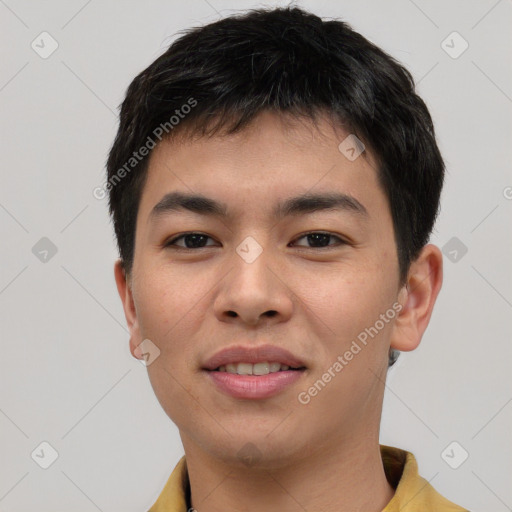 Joyful asian young-adult male with short  black hair and brown eyes