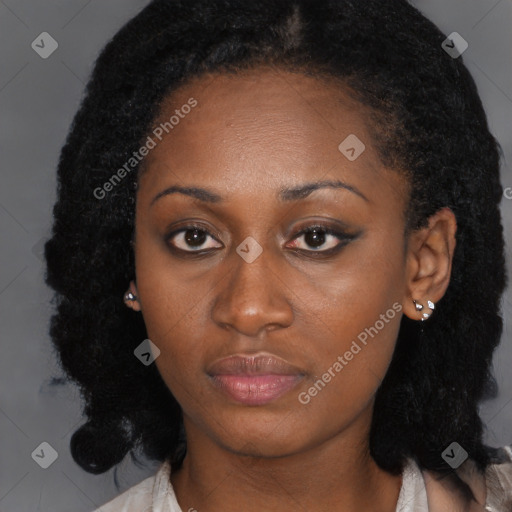 Neutral black young-adult female with medium  brown hair and brown eyes