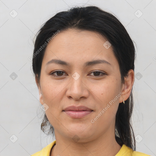 Joyful asian young-adult female with medium  brown hair and brown eyes