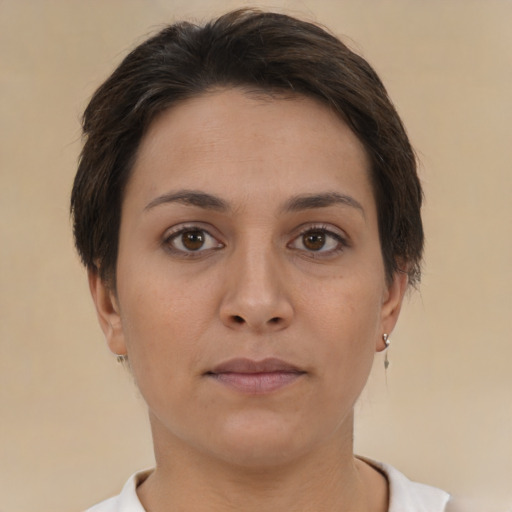 Neutral white young-adult female with short  brown hair and brown eyes