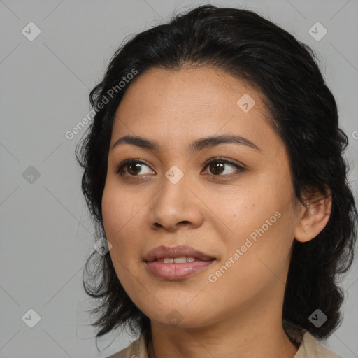 Joyful asian young-adult female with medium  black hair and brown eyes