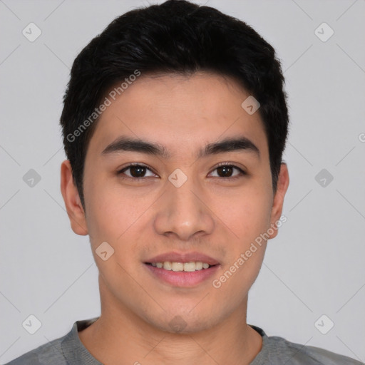 Joyful white young-adult male with short  black hair and brown eyes