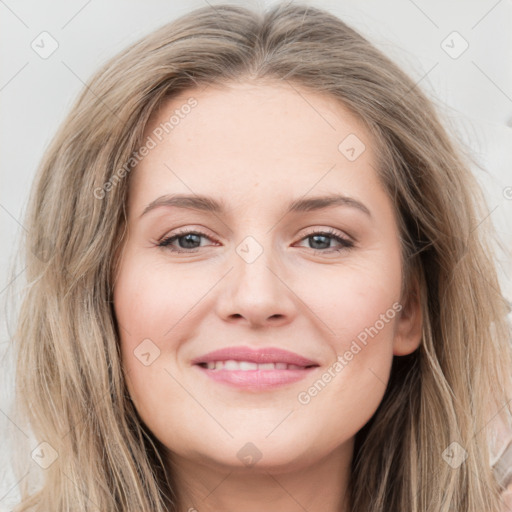 Joyful white young-adult female with long  brown hair and grey eyes