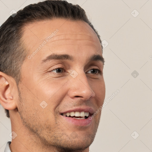 Joyful white adult male with short  brown hair and brown eyes