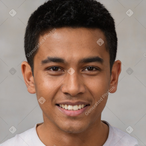 Joyful latino young-adult male with short  black hair and brown eyes