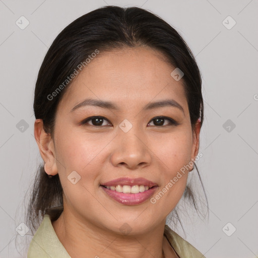 Joyful asian young-adult female with medium  brown hair and brown eyes