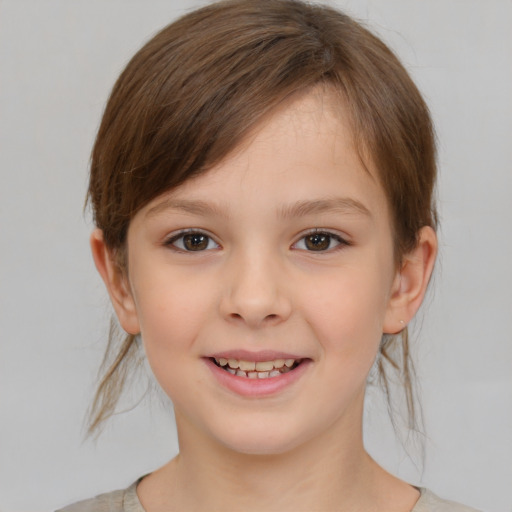 Joyful white child female with medium  brown hair and brown eyes