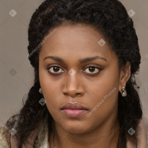 Neutral black young-adult female with long  brown hair and brown eyes