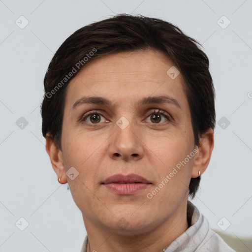 Joyful white adult female with short  brown hair and brown eyes