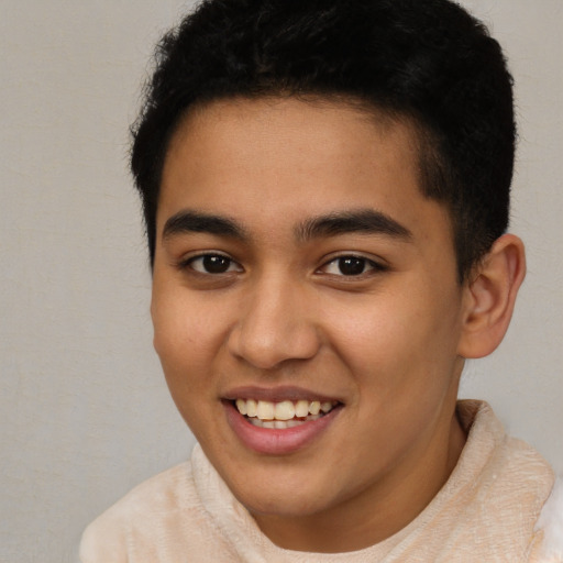 Joyful latino young-adult male with short  brown hair and brown eyes