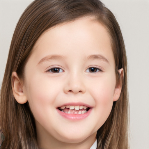 Joyful white child female with long  brown hair and brown eyes