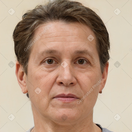 Joyful white middle-aged male with short  brown hair and brown eyes