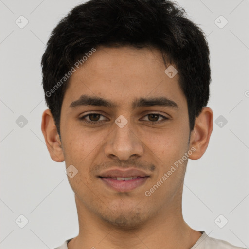 Joyful latino young-adult male with short  black hair and brown eyes