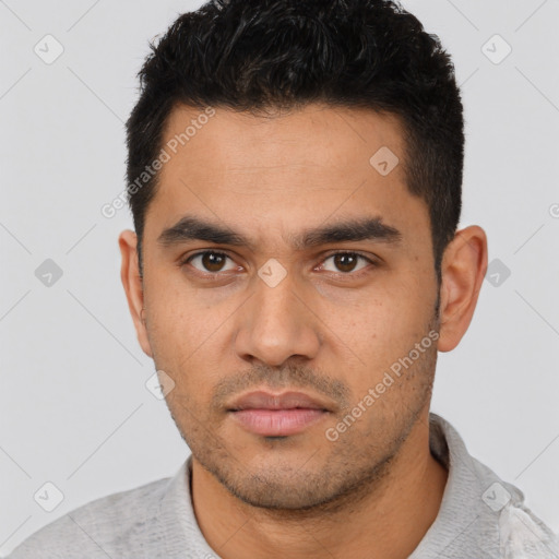 Neutral latino young-adult male with short  black hair and brown eyes