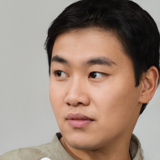 Neutral asian young-adult male with short  black hair and brown eyes