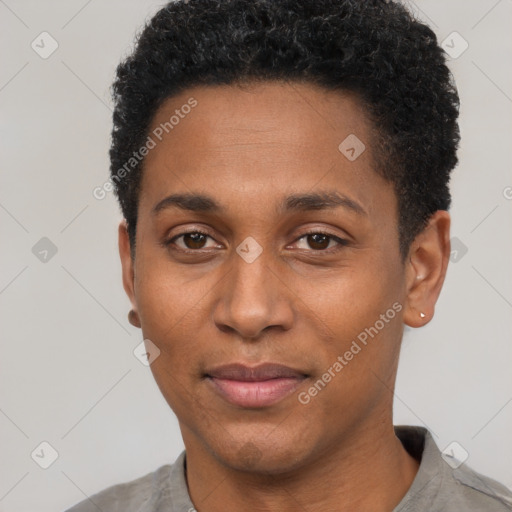 Joyful black young-adult male with short  black hair and brown eyes