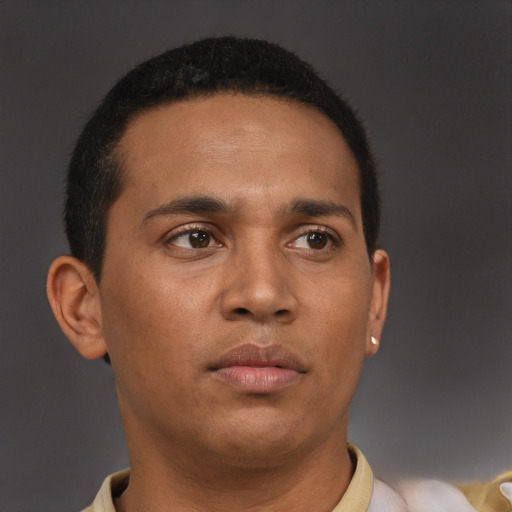 Neutral latino young-adult male with short  brown hair and brown eyes