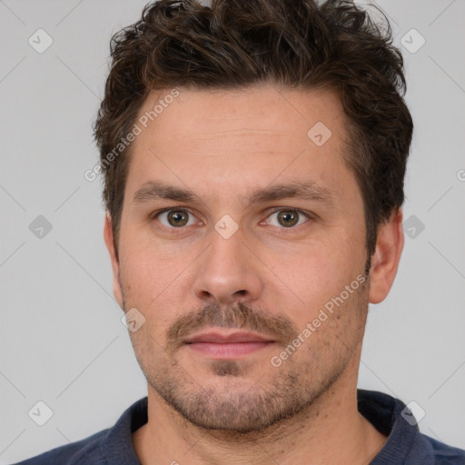 Neutral white adult male with short  brown hair and brown eyes