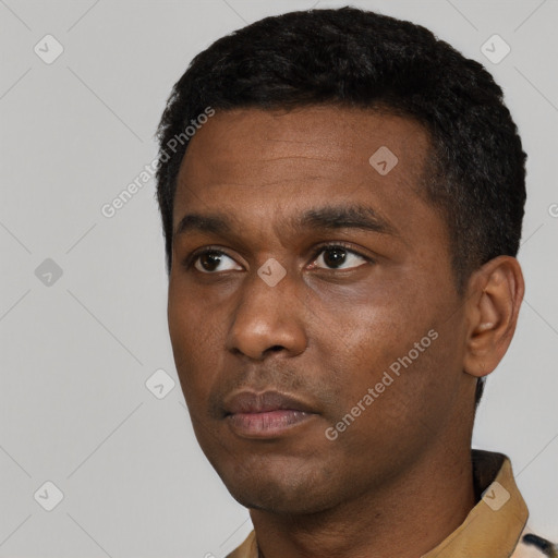Neutral black young-adult male with short  black hair and brown eyes