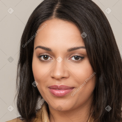 Joyful latino young-adult female with long  brown hair and brown eyes