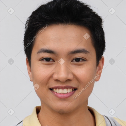 Joyful asian young-adult male with short  black hair and brown eyes