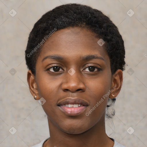 Joyful black young-adult female with short  brown hair and brown eyes