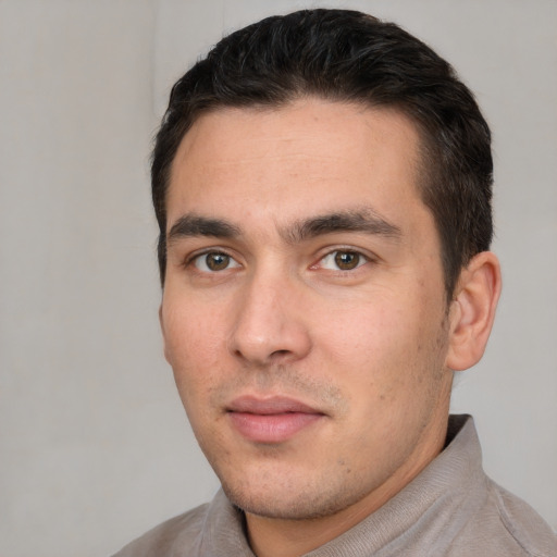 Neutral white young-adult male with short  black hair and brown eyes