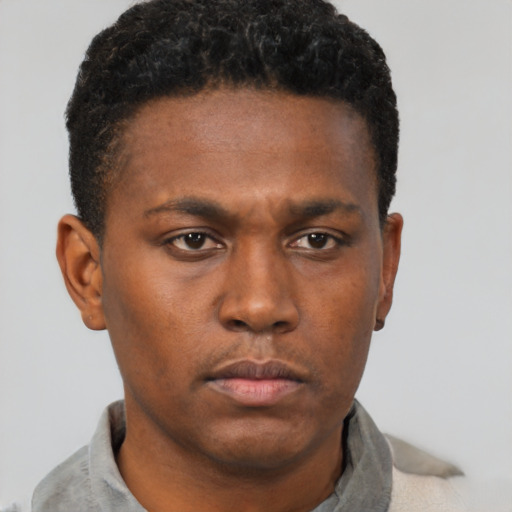 Neutral black young-adult male with short  brown hair and brown eyes